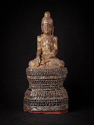 Antique wooden Shan Buddha from Burma on a high throne decorated with glass inlay