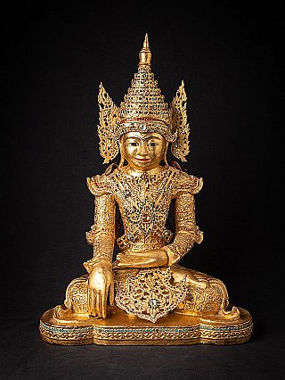Gilded crowned Buddha from Burma in royal dress with glass inlay