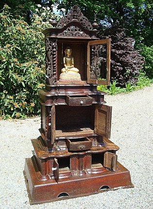 Burmese wooden Buddha temple shrine with doors and drawers opened, front view