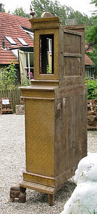 Antique wooden Burmese temple shrine, side view showing plain back panels and the upper opening