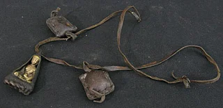 Buddha neckless with bronze hanger in leather bag