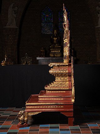 Burmese wooden throne, side profile showing the stepped base and tall back structure