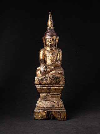 Burmese Shan Buddha statue in wood, seated in bhumisparsha mudra, full-front view