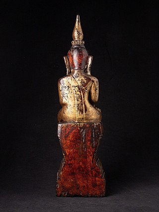 Burmese Shan Buddha statue in wood, rear view showing red lacquer on the back and base
