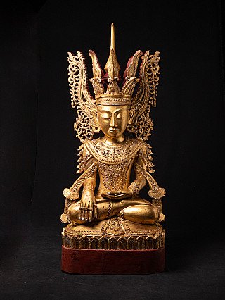 Große gekrönte Buddha-Statue aus Holz aus Burma, frontale Ansicht mit rotem Sockel