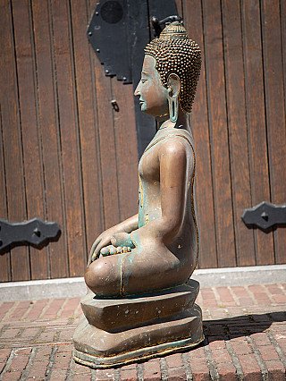 Old bronze Thai Buddha statue