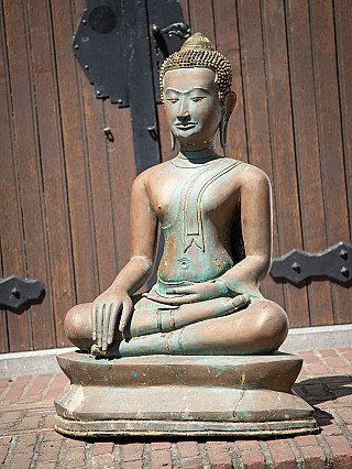 Old bronze Thai Buddha statue