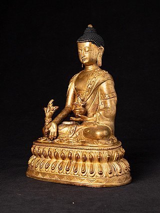 Medizinbuddha-Statue aus Nepal in Bronze, sitzend auf Lotossockel, Dreiviertelansicht links