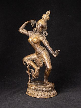 Old bronze dancing Dakini statue