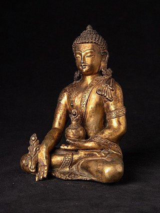 Medizin-Buddha-Statue aus Bronze aus Nepal, Dreiviertelansicht mit Schale im Schoß