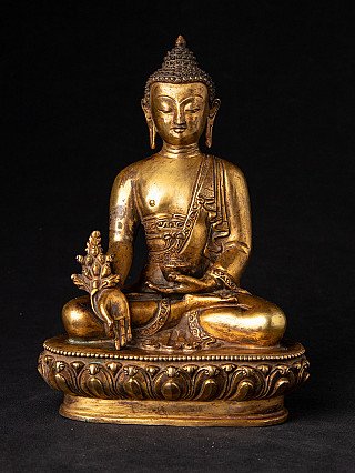 Bronze-Medizinbuddha aus Nepal, sitzend auf Lotussockel, Frontalansicht mit Varada-Mudra