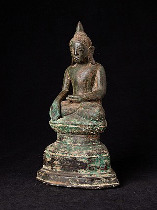Burmese Shan Buddha statue in bronze, three-quarter left view on tiered base