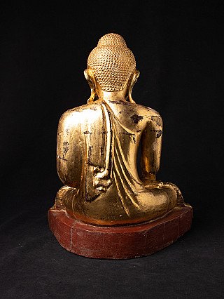 Mandalay Buddha statue in wood from Burma (Myanmar), rear view with robe draped down the back