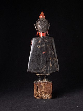 Wooden Tai Lue Buddha statue from Laos, standing rear view with red neck area and black lacquer robe