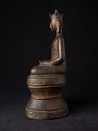 Burmese bronze Buddha statue seated in dhyana mudra, left side profile