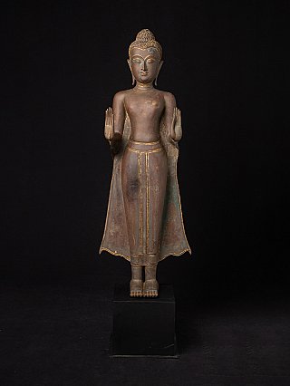 Thai bronze Buddha statue standing in Abhaya mudra, full frontal view on black base