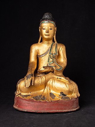 Burmese bronze Buddha statue seated in bhumisparsha mudra, full-front view