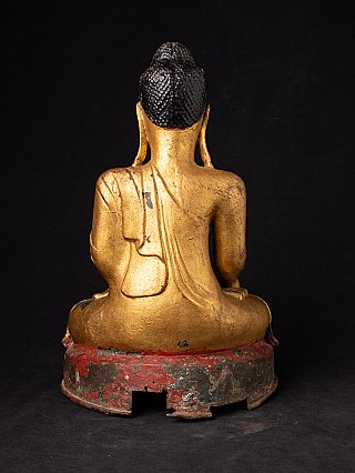 Burmese bronze Buddha statue, rear view showing robe drape and red base