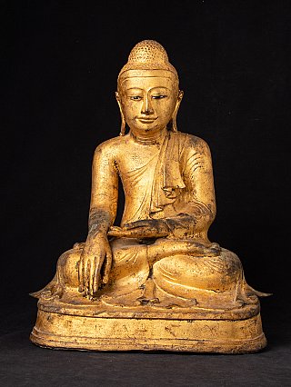 Antique Mandalay Buddha statue in bronze from Burma, seated in bhumisparsha mudra, full front view