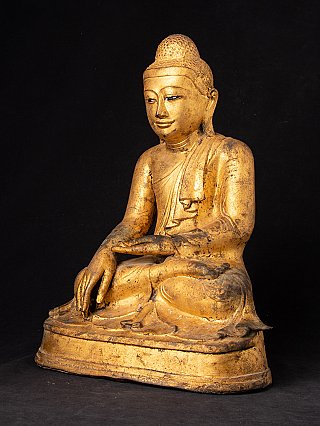 Mandalay Buddha statue in bronze from Burma, three-quarter left view with bhumisparsha gesture
