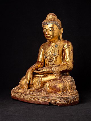 Mandalay Buddha statue from Burma in wood, seated, three-quarter right view