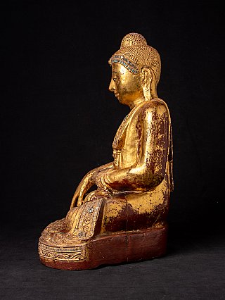 Wooden Buddha statue from Burma in Mandalay style, seated, left side profile