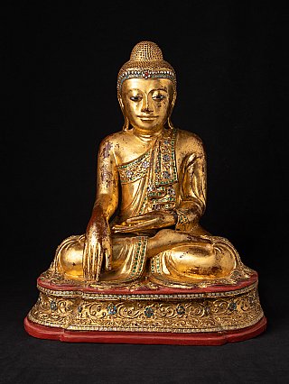 Wooden Mandalay Buddha statue from Myanmar, seated in bhumisparsha mudra, full front view