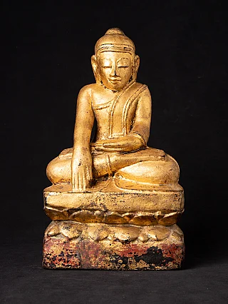 Antique wooden Burmese Buddha statue