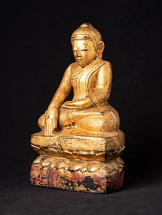 Holz-Buddha aus Myanmar mit vergoldeter Oberfläche, sitzend, Dreiviertelansicht links