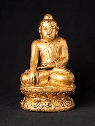 Antike holzerne Birmanische Buddhafigur