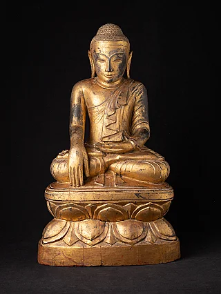 Burmese Shan Buddha statue in wood, seated in bhumisparsha mudra, full front view