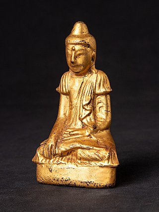 Hölzerne Shan-Buddha-Statue aus Myanmar, sitzend, Dreiviertelansicht links