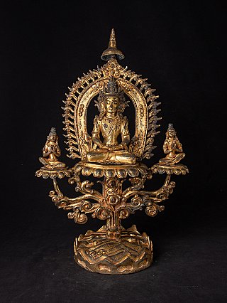 Antike nepalesische Buddha-Statue aus Bronze, sitzend mit Aureole und zwei Begleitfiguren, Frontalansicht