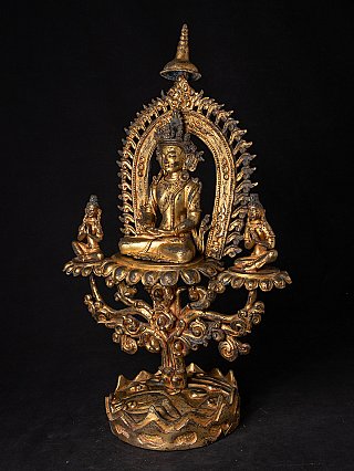 Nepalesische Buddha-Statue aus Bronze mit Aureole und Begleitfiguren, Dreiviertelansicht links