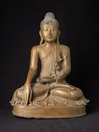 Beautiful antique bronze Mandalay Buddha statue
