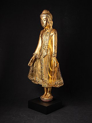 Mandalay Burmese wooden Buddha statue, gilded, three-quarter view