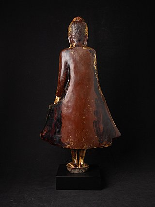 Mandalay Burmese wooden Buddha statue, rear view showing brown robe back