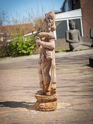 Indian Apsara lady statue in wood, side profile showing the arms and lotus base