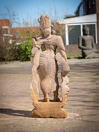 Rear view of the Indian Apsara lady statue in wood, showing the back carving and base