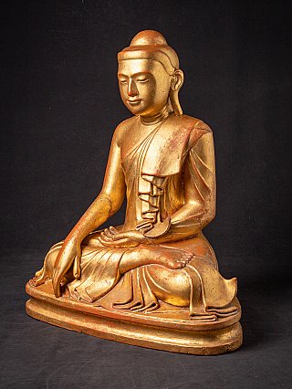 Antique wooden Buddha statue from Burma (Myanmar), Mandalay style, three-quarter view
