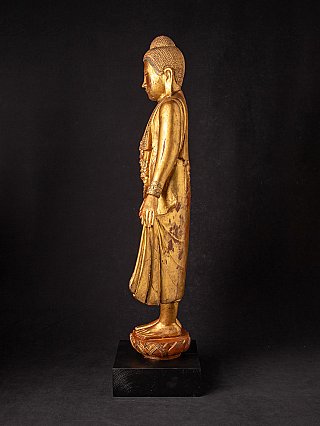 Hölzerne Mandalay-Buddha-Statue, stehend und vergoldet, Seitenansicht links