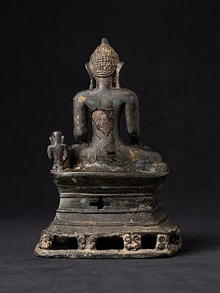 Arakan bronze Buddha statue, rear view showing wear and patina on back and base