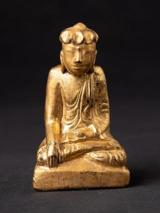 Antique Burmese wooden Buddha statue seated in bhumisparsha mudra, full front view