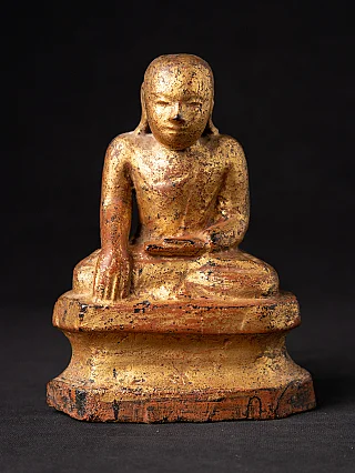 Antique wooden Burmese monk statue