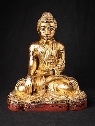 Antique wooden Mandalay Buddha statue