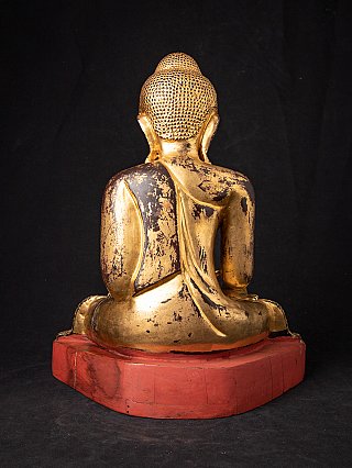 Hölzerne Mandalay-Buddha-Statue aus Myanmar, Rückansicht mit Abrieb der Vergoldung und rotem Sockel