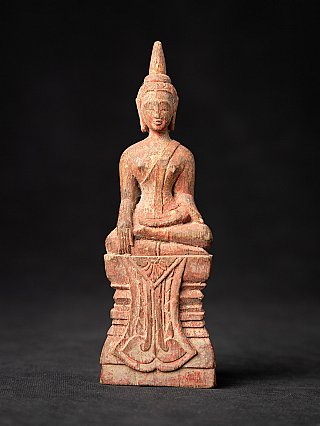 Thai wooden Buddha statue seated in bhumisparsha mudra, full front view