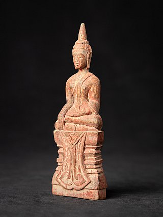 Antique wooden Thai Buddha statue