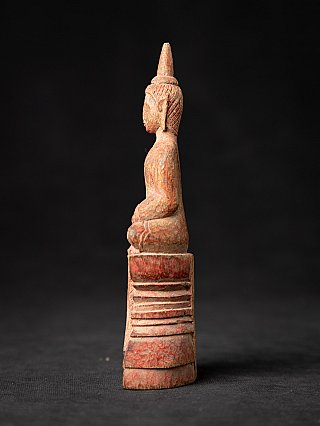 Antique wooden Thai Buddha statue