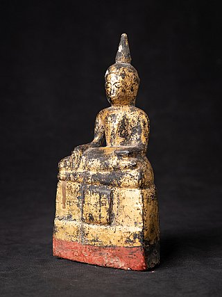 Antique wooden Thai Buddha statue